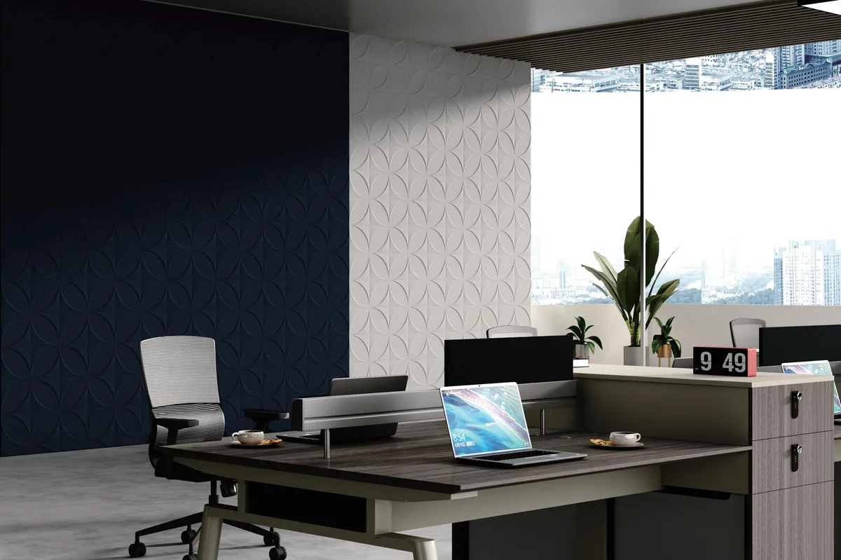Office with a 3D acoustic panel wall with a petal pattern
