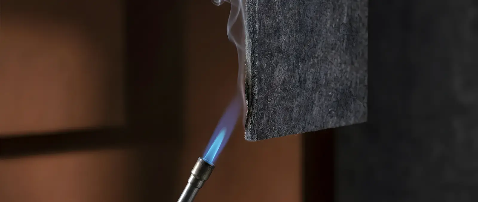 Fire test on a felt acoustic panel: flame with no spread, EN 13501-1 B-s1,d0 classification